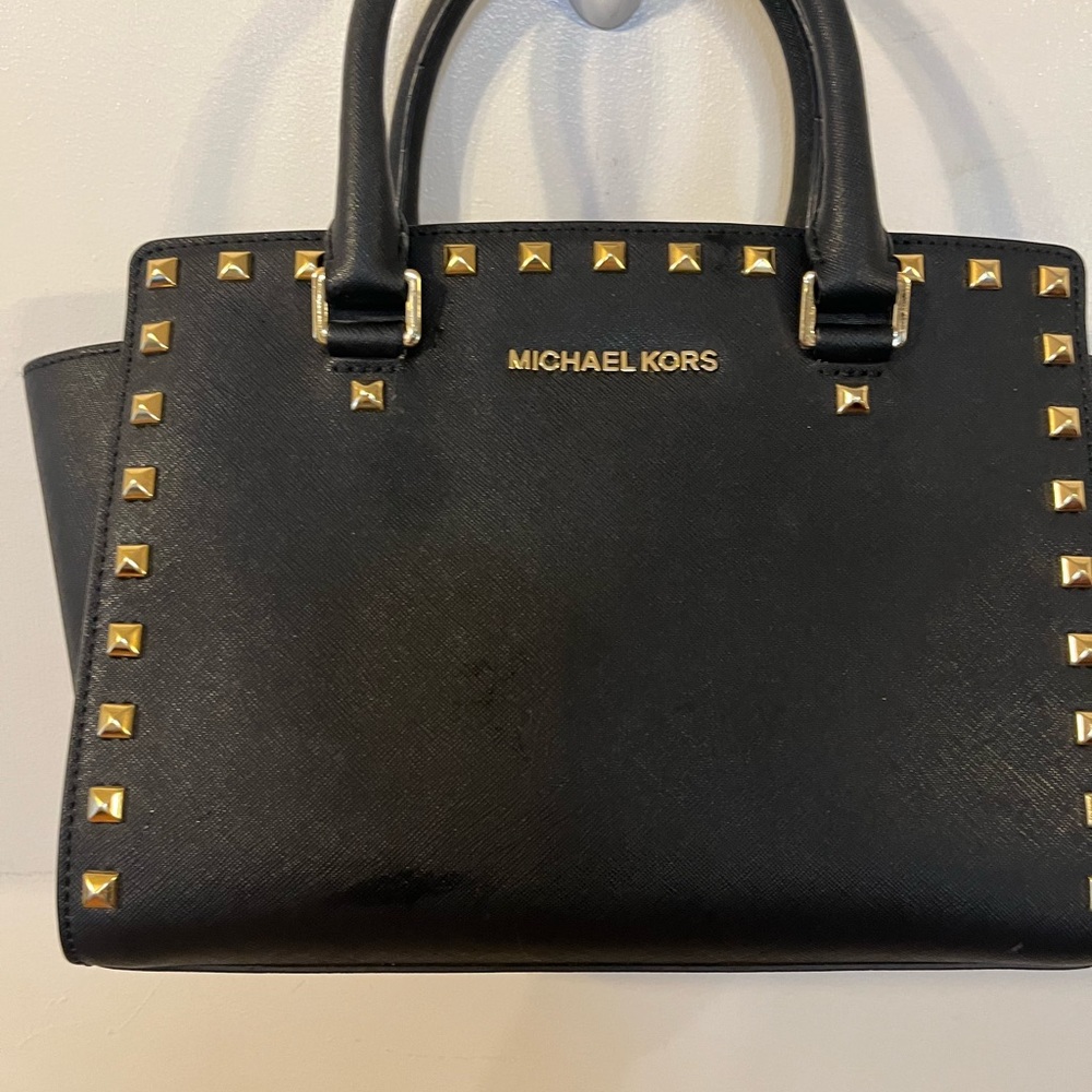 Black with gold accents. Kate Spade handbag